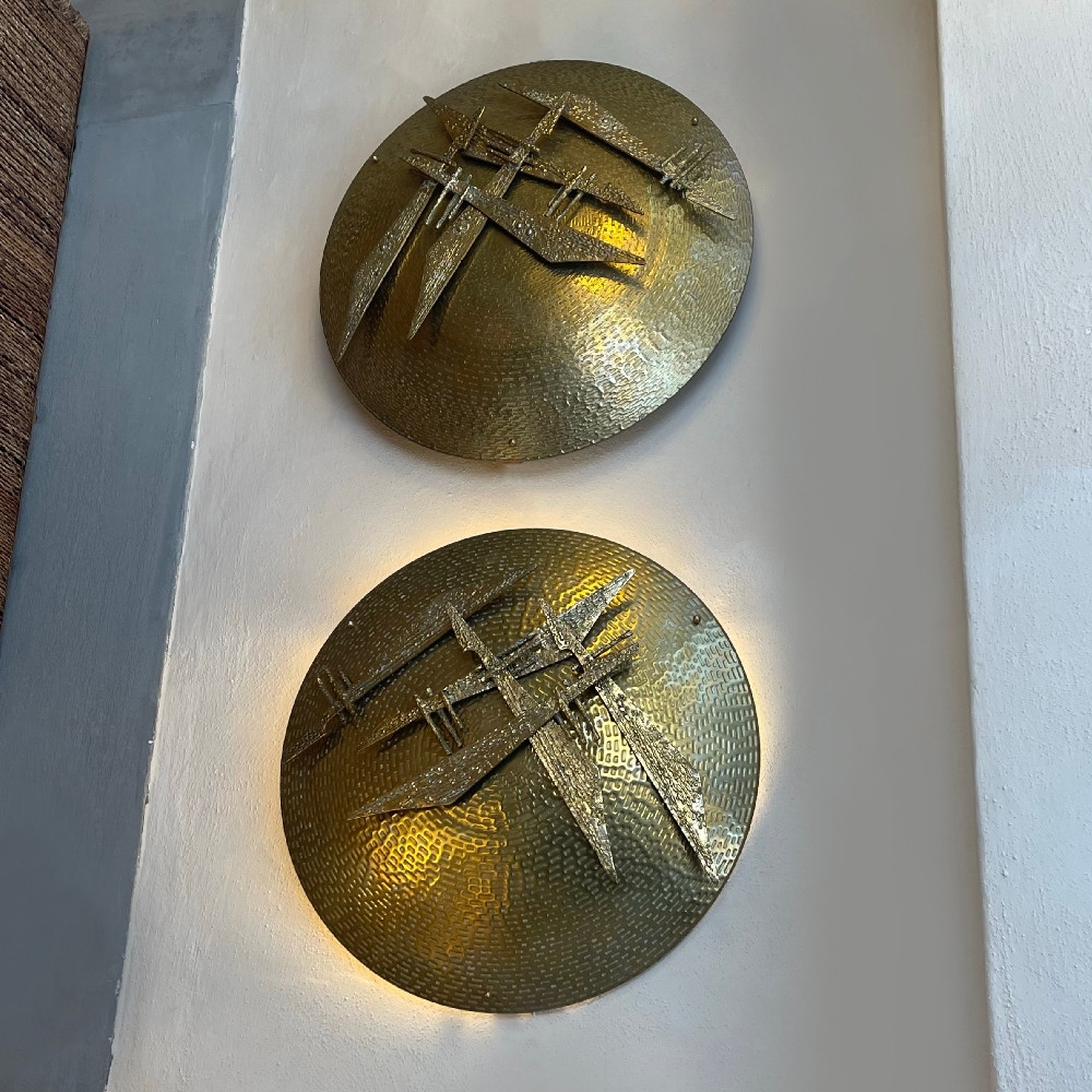 Late 20th Century Pair of Italian Hammered Brass & Cast Brass Shield Sconces